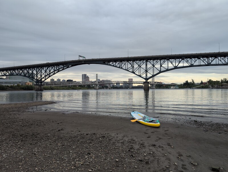 photo of paddleboard on a beach